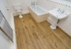 Влагостойкий деревянный пол в ванной комнате